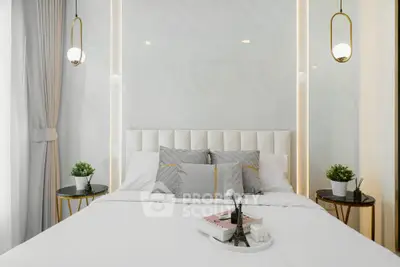 Luxurious bedroom with elegant decor and modern lighting, featuring a plush bed and stylish side tables.