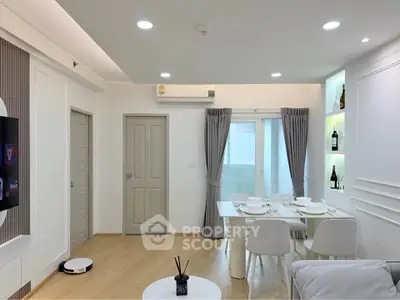 Modern living room with dining area, sleek furniture, and ambient lighting in a stylish apartment.