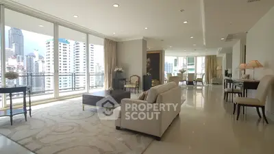 Luxurious spacious living room with stunning city view and elegant decor