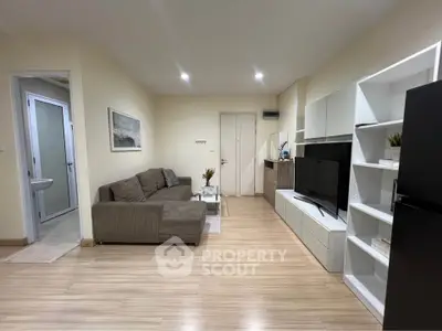 Modern living room with sleek furniture and open layout, perfect for relaxation and entertainment.
