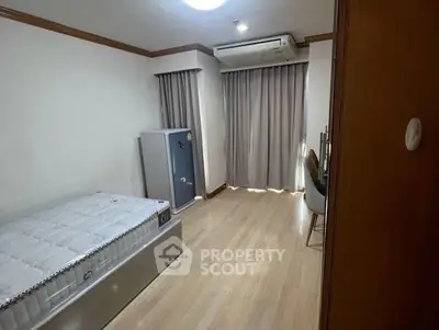 Spacious bedroom with minimalist design and natural light