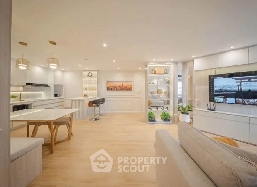 Spacious modern living room with open kitchen and elegant decor
