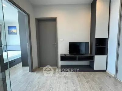 Modern living room with sleek TV setup and minimalist design