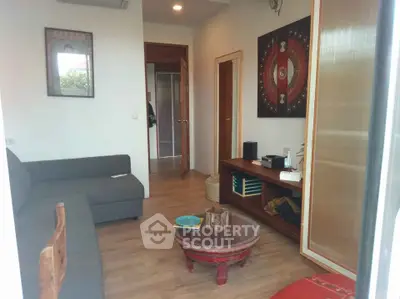 Cozy living room with modern decor and wooden flooring