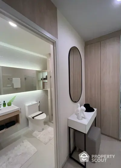 Modern bathroom with sleek design and elegant fixtures in a contemporary home.