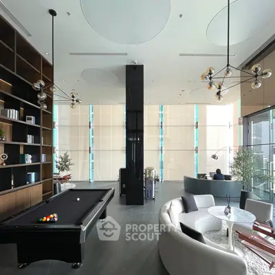 Luxurious modern living room with pool table and elegant decor