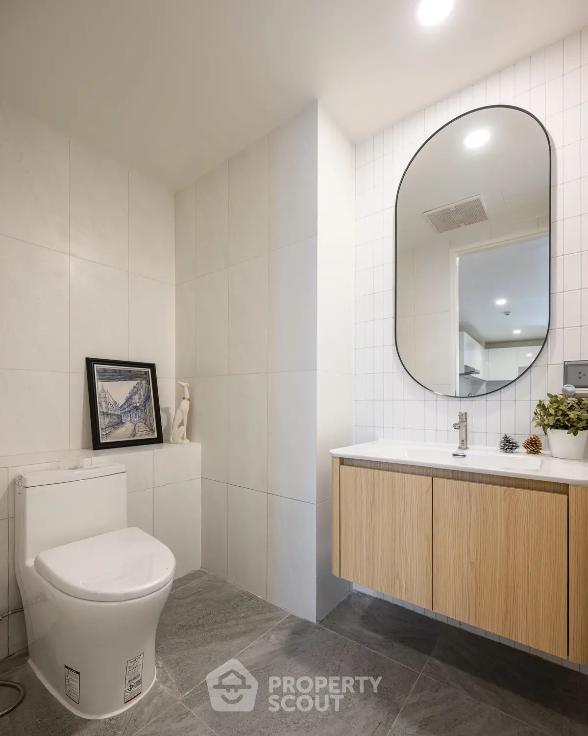 Modern bathroom with sleek fixtures and elegant decor in a contemporary home.