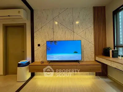 Modern living room with stylish TV setup and elegant decor