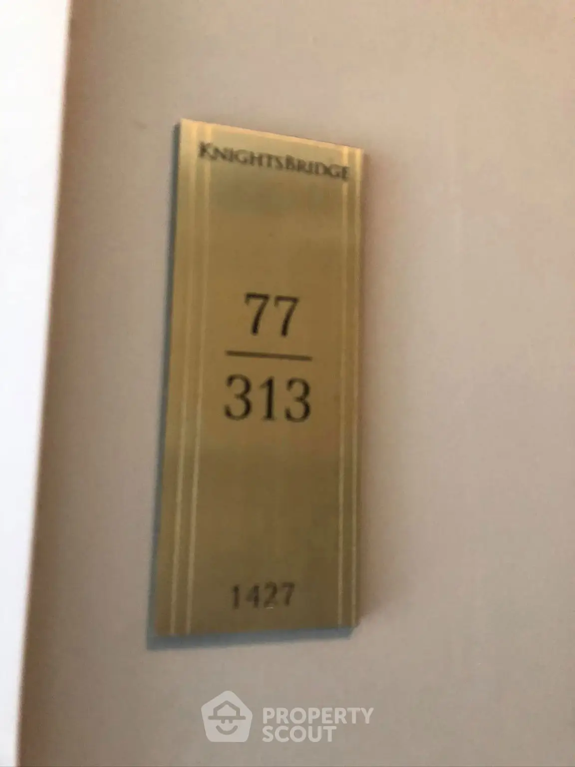 Elegant door sign with apartment number in Knightsbridge