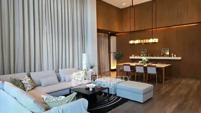 Luxurious modern living room with high ceilings and elegant decor