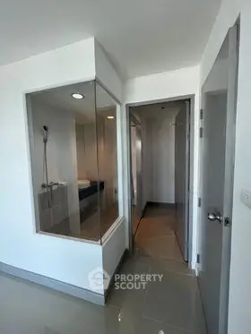 Modern bathroom with glass shower enclosure and sleek design