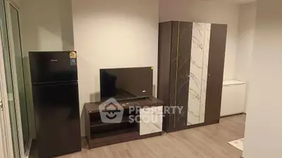Modern apartment interior with sleek furniture and appliances