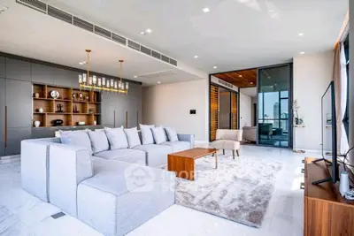 Luxurious modern living room with elegant decor and spacious seating area