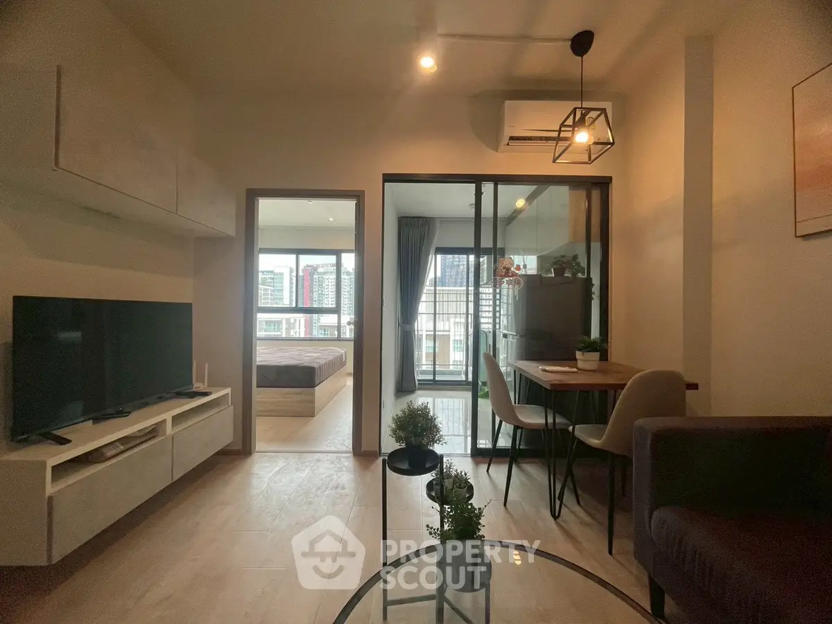 Modern living room with balcony view in stylish apartment