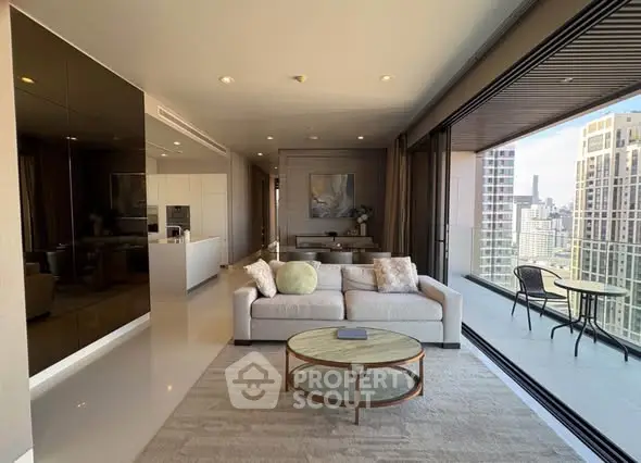 Luxurious living room with stunning city view and spacious balcony