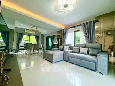 Luxurious modern living room with elegant decor and spacious layout, perfect for relaxation and entertainment.