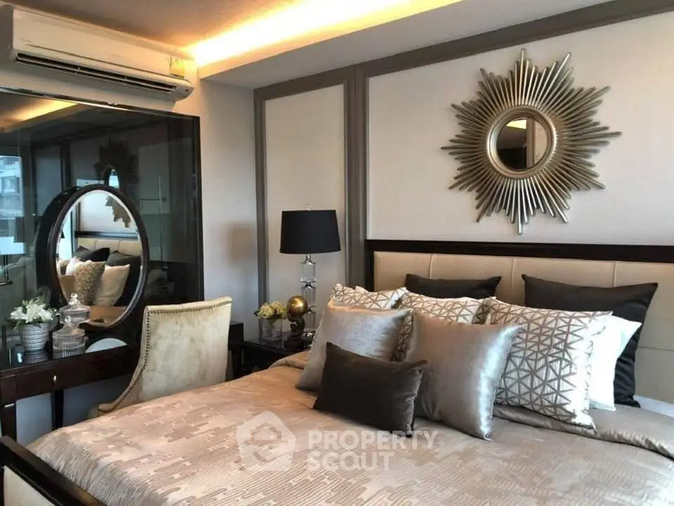 Luxurious bedroom with elegant decor and stylish furnishings in modern apartment.