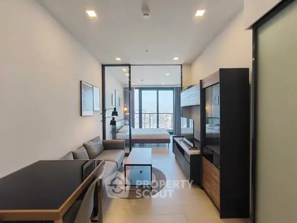 Modern studio apartment with open layout and city view