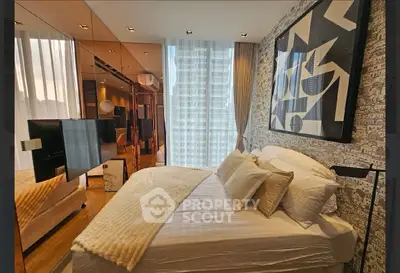 Luxurious bedroom with modern decor and floor-to-ceiling windows offering stunning city views.