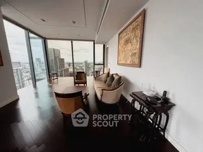 Luxurious living room with panoramic city views and elegant furnishings.