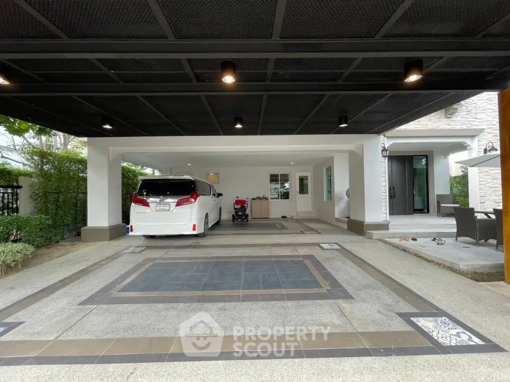 Spacious modern garage with stylish flooring and ample parking space