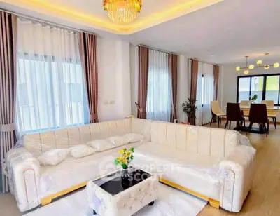 Luxurious modern living room with elegant dining area and stylish lighting