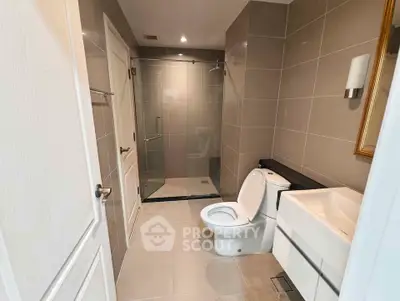 Modern bathroom with sleek design and spacious shower area