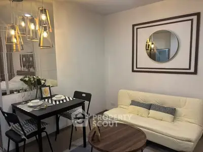 Modern living room with stylish lighting and cozy seating area