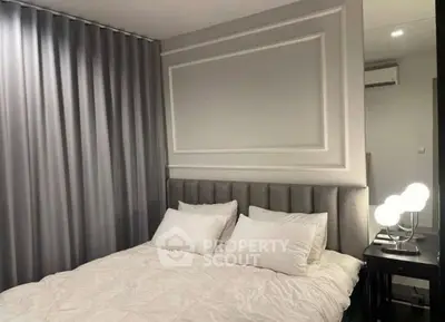 Elegant bedroom with modern decor and soft lighting