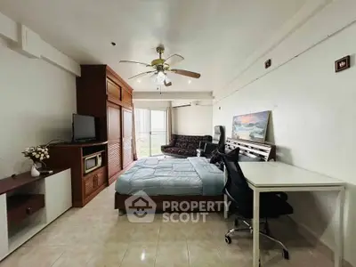 Spacious studio apartment with modern furnishings and natural light