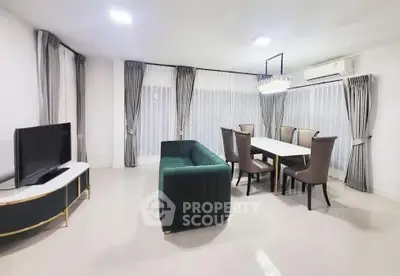 Spacious modern living room with elegant dining area and stylish furniture