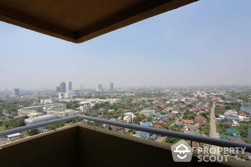 Stunning high-rise balcony view overlooking cityscape and skyline