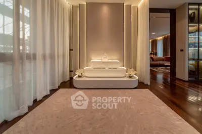 Luxurious modern living room with elegant decor and ambient lighting