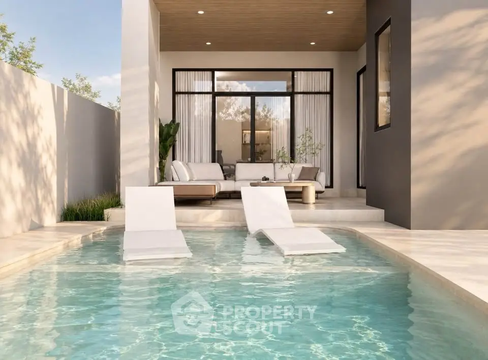 Luxurious modern villa with private pool and stylish outdoor seating area.