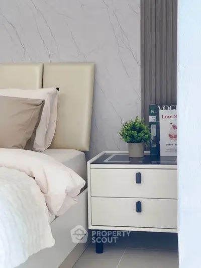 Elegant bedroom with modern decor and stylish nightstand
