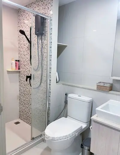 Modern bathroom with sleek shower and contemporary fixtures