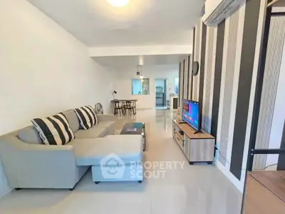 Spacious modern living room with stylish decor and open layout