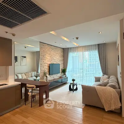 Spacious modern living room with large windows and stylish decor