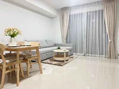 Modern living room with elegant decor and natural light