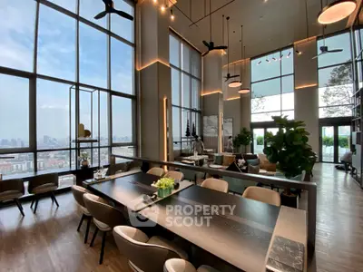 Luxurious high-rise living room with panoramic city views and modern decor