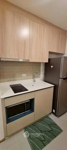 Modern kitchen with sleek cabinetry and stainless steel appliances