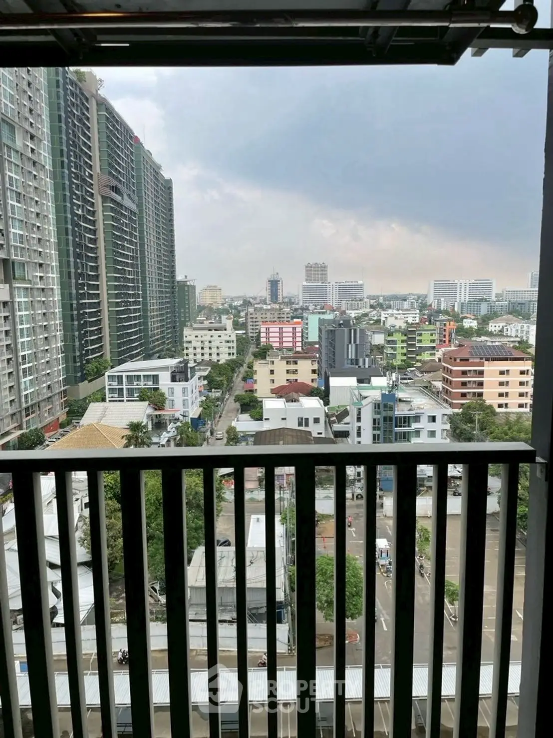 Stunning cityscape view from a high-rise balcony, perfect for urban living enthusiasts.