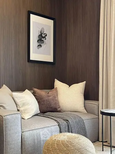 Cozy living room with modern gray sofa and stylish decor