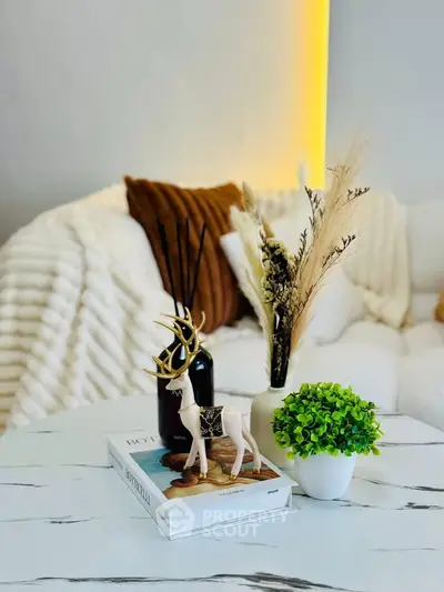 Stylish living room with cozy decor and modern accents