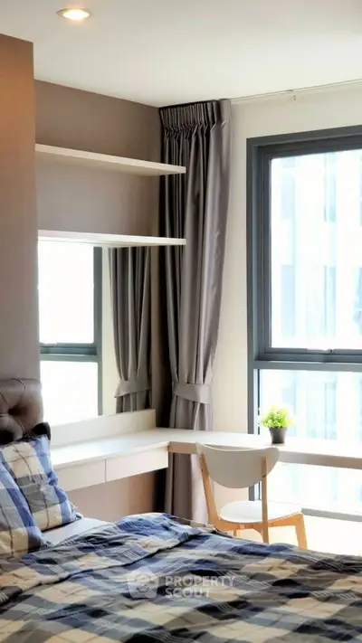 Bright and modern bedroom with large window and stylish decor