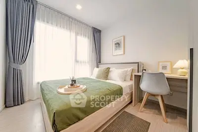 Modern bedroom with stylish decor and natural light