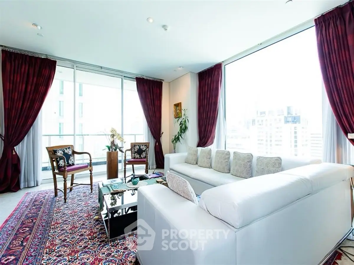 Luxurious living room with elegant decor and city view