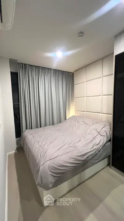 Modern bedroom with stylish decor and cozy ambiance