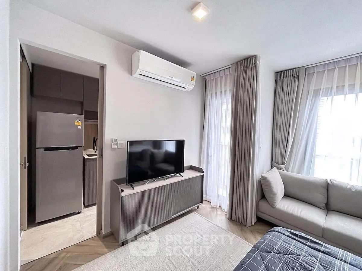 Modern living room with air conditioning and natural light