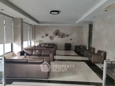 Spacious modern living room with elegant decor and ample seating